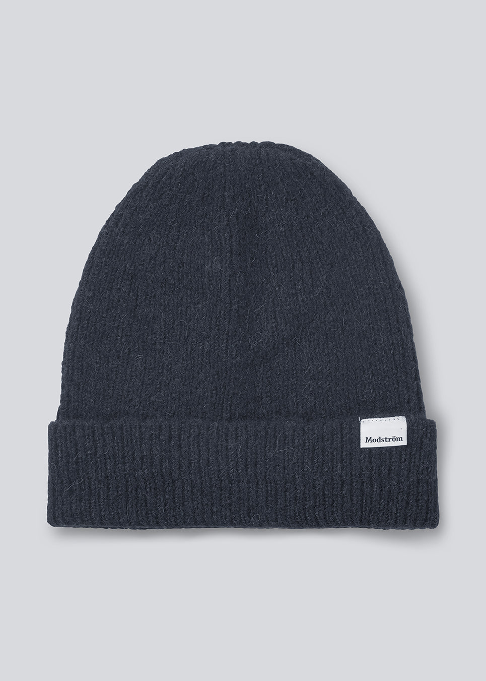 Warm navy hat in a nice wool mixture. Foxie hat is perfect for the cold days.