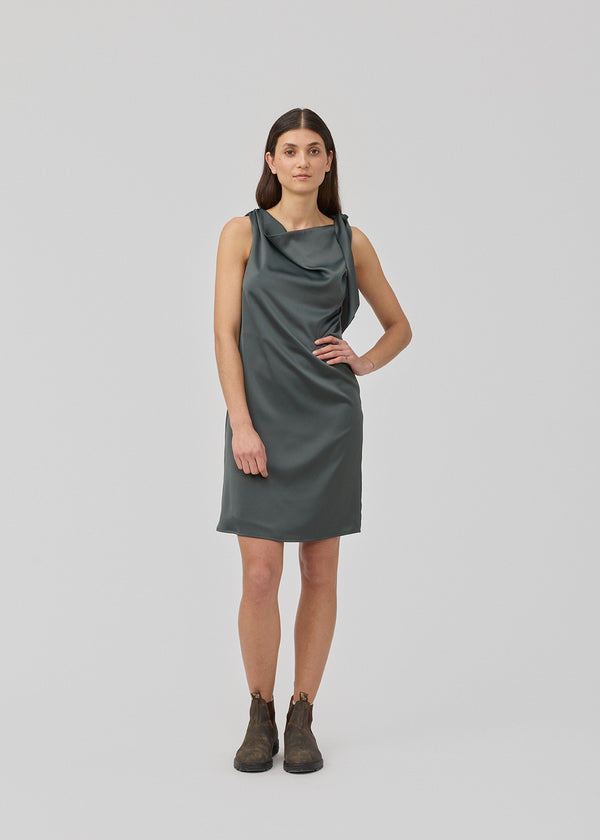 Midi satin dress with waterfall detail at the neck. KatjaMD dress has a tie detail at the shoulder and a relaxed fit.