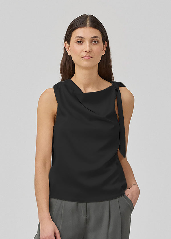 Black satin top with waterfall detail at the neck. Katja MD top has a tie detail at the shoulder and a relaxed fit.