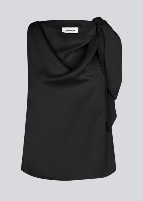 Black satin top with waterfall detail at the neck. Katja MD top has a tie detail at the shoulder and a relaxed fit.