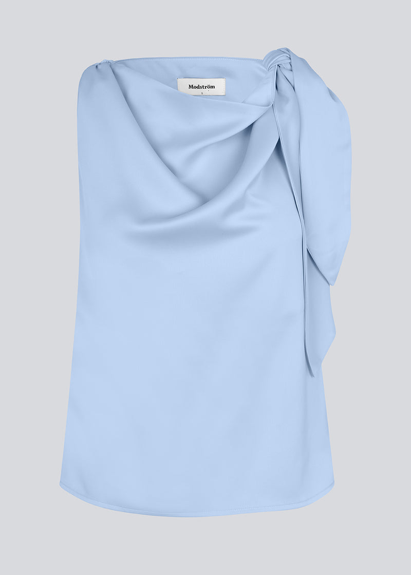 Satin top with waterfall detail at the neck. Katja MD top has a tie detail at the shoulder and a relaxed fit.