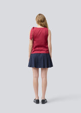 Satin top with waterfall detail at the neck. Katja MD top has a tie detail at the shoulder and a relaxed fit.