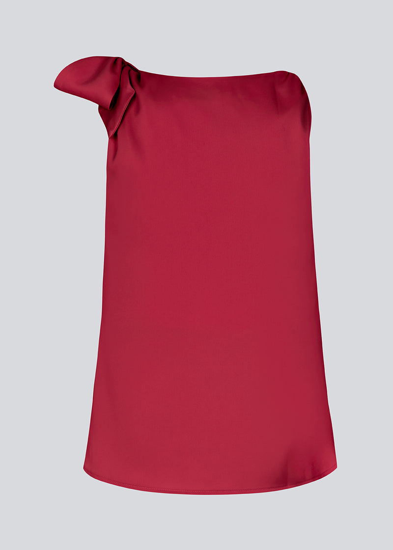 Satin top with waterfall detail at the neck. Katja MD top has a tie detail at the shoulder and a relaxed fit.