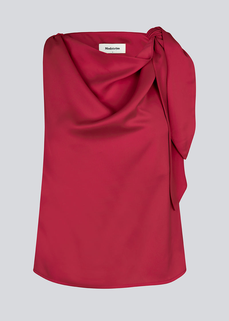 Satin top with waterfall detail at the neck. Katja MD top has a tie detail at the shoulder and a relaxed fit.