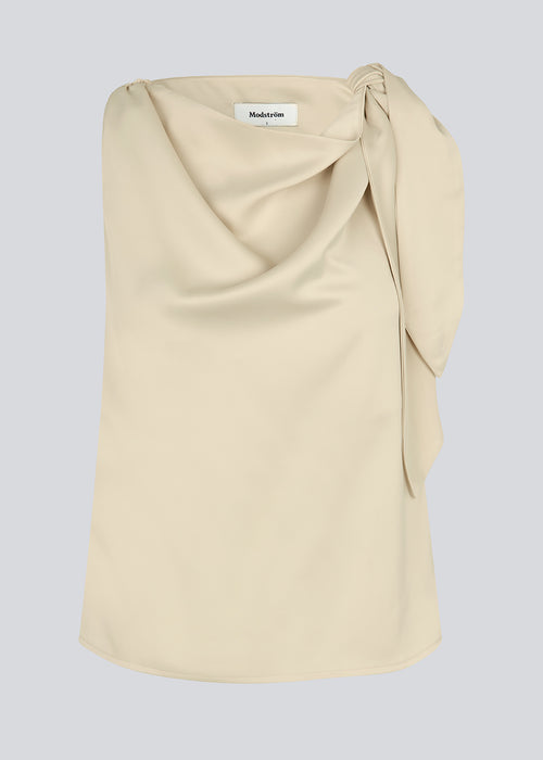 Satin top with waterfall detail at the neck. Katja MD top has a tie detail at the shoulder and a relaxed fit.