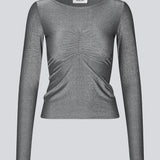 Silver top with long sleeves in an elastic material. KelaniMD top has an elastic gathering at the chest and a wide neckline.
