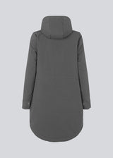 A warm water-repellent winter coat in grey with a high collar and hood. Keller coat has a hidden button and zipper closure at the front, along with zipped pockets. The coat has a relaxed silhouette with an adjustable elastic at the waist. The filling is a sustainable polyester padding with an extra high insulation ability.