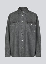 Oversize grey shirt in cotton denim. KenaMD shirt has two chest pockets, shirt collar and a cuff with button closure.
