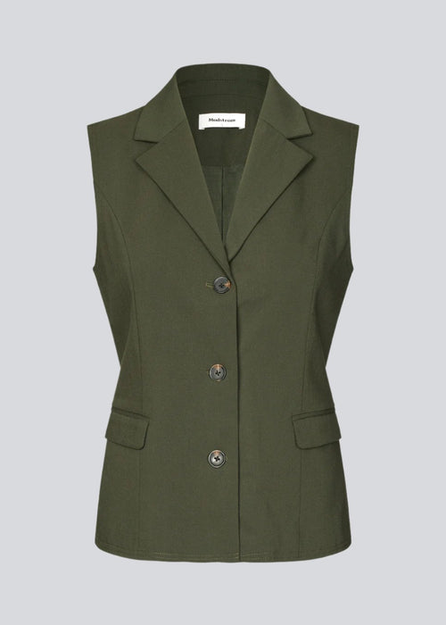 Fitted green vest with lining. KimanaMD vest has a blazer collar and two pocket in front.