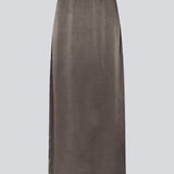 Loose elegant maxi skirt in viscose satin in brown. KindleMD skirt has a slit in the back and an invisible zipper on the side.
