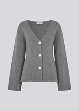 Flat knitted cardigan in grey with a V-neck in 100% wool. KlaytonMD cardigan is fitted and has long wide sleeves and buttons in the front.&nbsp;