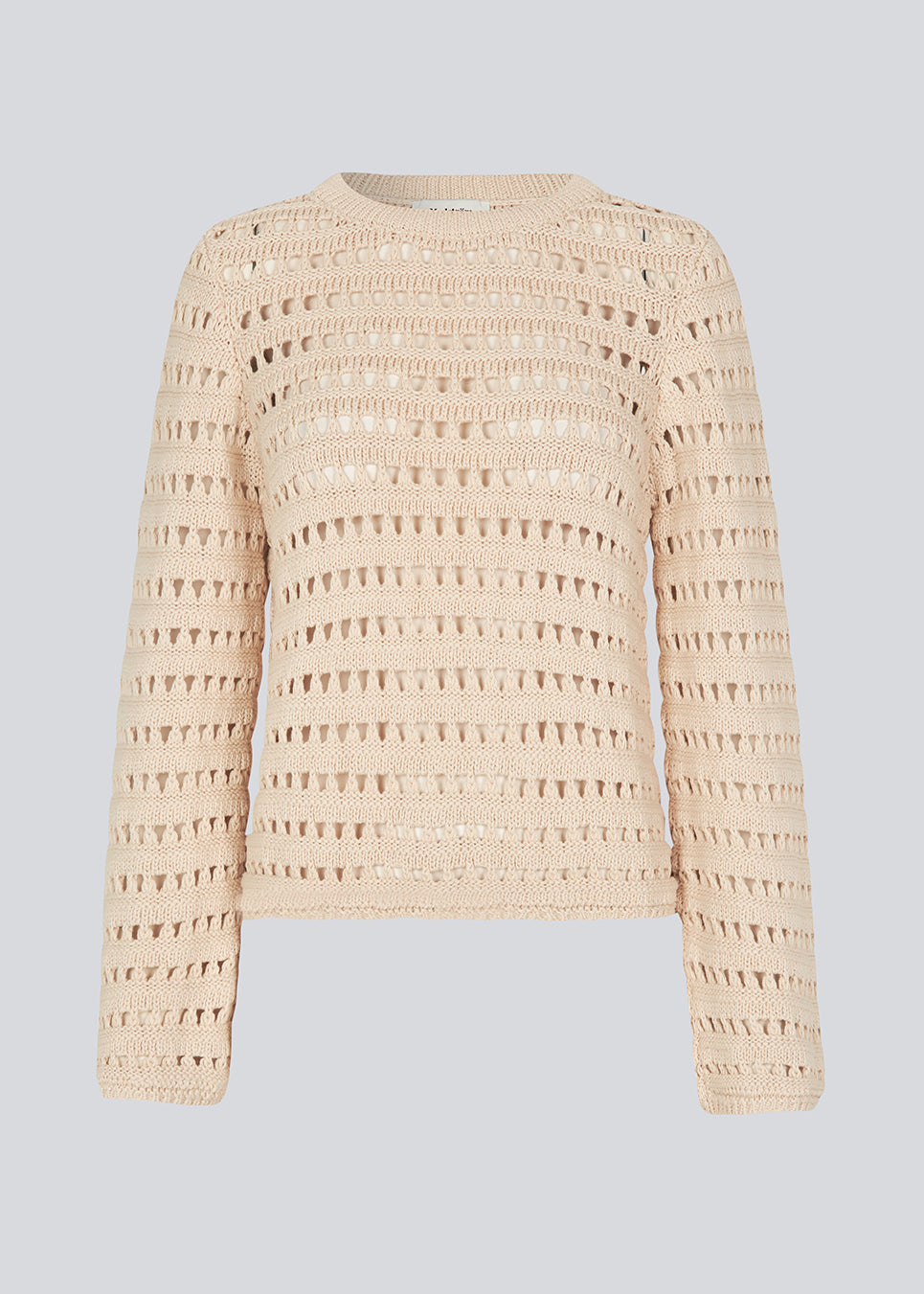 Slightly see through knit with a hole pattern. KolbyMD o-neck in color Summer Sand has a relaxed fit and loose sleeve.