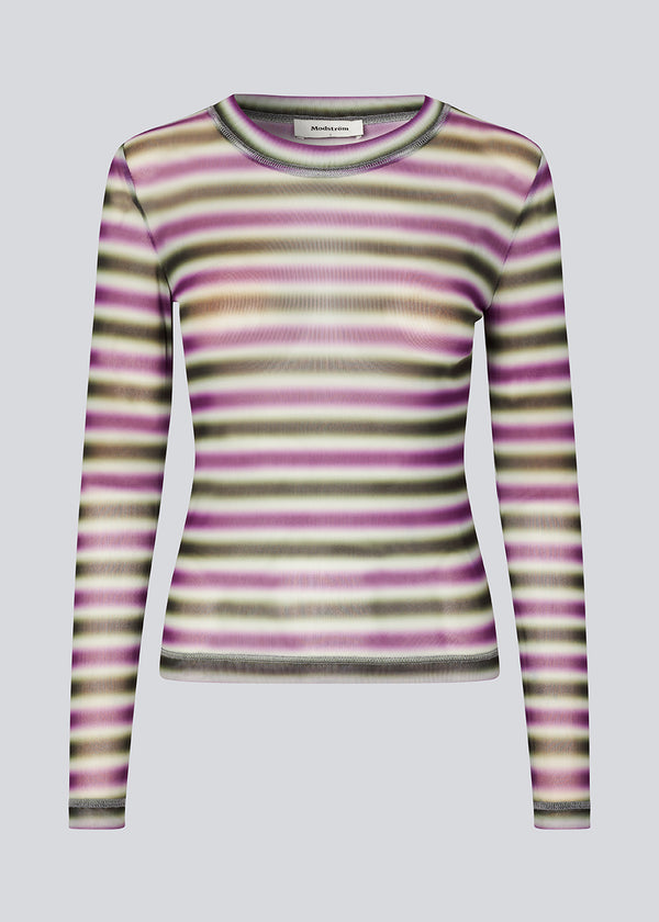 Fitted striped top with long sleeves. KrewMD LS top is made in a slightly see through material.