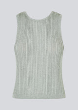 Sleeveless silver knitted top in a metallic material. KristenMD top has a loose fit, a round neck and a deep back neckline.