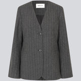 Fitted dark grey blazer in a pinstriped wool mix. KristolMD blazer has shoulder pads, two pockets in front, lining and a slit in the back.