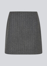 Short dark grey skirt in a pinstriped wool mix. KristolMD skirt has lining and an invisible zipper in the side.
