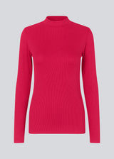 Long sleeved t-shirt in pink with a high neck. Krown LS t-neck is in a ribbed quality and has a tight fit. The t-neck is in a nice EcoVero viscose quali