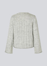 Loose grey wool knit with wide sleeves in cable knit. KurtisMD o-neck has a round neckline and rolled edges.