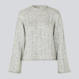 Loose grey wool knit with wide sleeves in cable knit. KurtisMD o-neck has a round neckline and rolled edges.