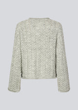 Loose grey wool knit with wide sleeves. KurtisMD v-neck has a v-neck and rolled edges.