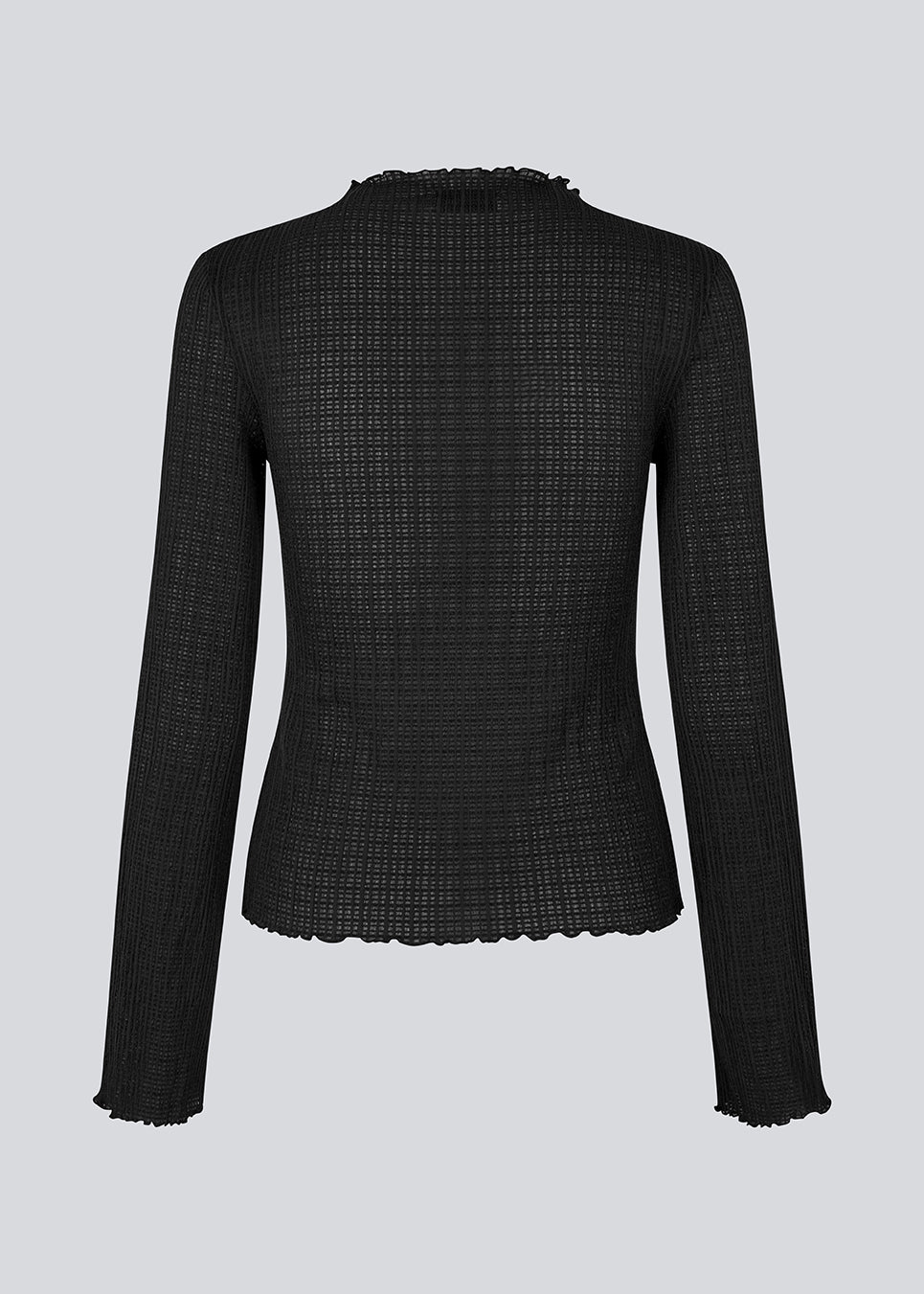 Longsleeved black top in an elastic and slighly see-through material. LaceyMD is fitted and has a high neck.