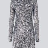 Short dress with silver sequins. LaraMD dress has a slim silhouette with a round neck and longsleeves, along with a keyhole opening at the back with a button closure.