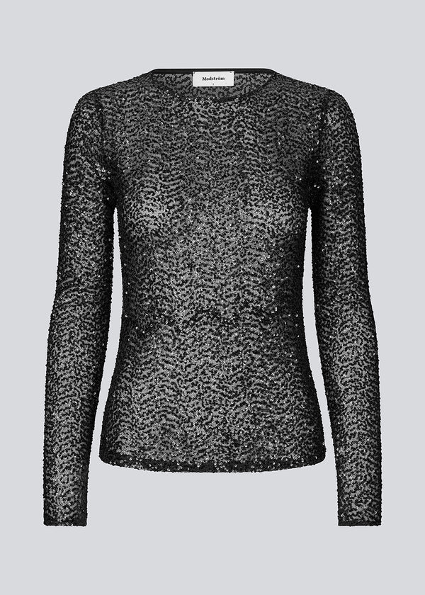 Black longsleeved top in sequence jersey. LaraMD top is fitted and has a round neck.