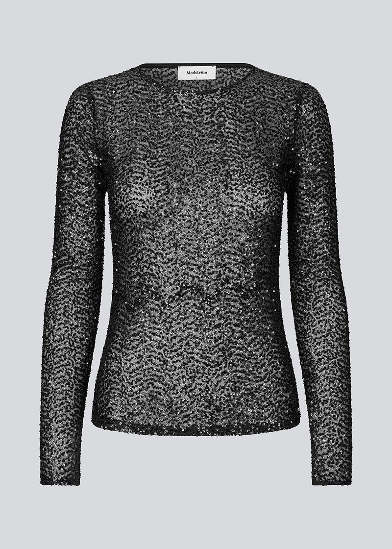 Black longsleeved top in sequence jersey. LaraMD top is fitted and has a round neck.