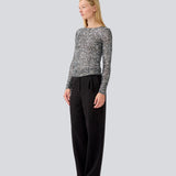 longsleeved top in silver sequence jersey. LaraMD top is fitted and has a round neck.
