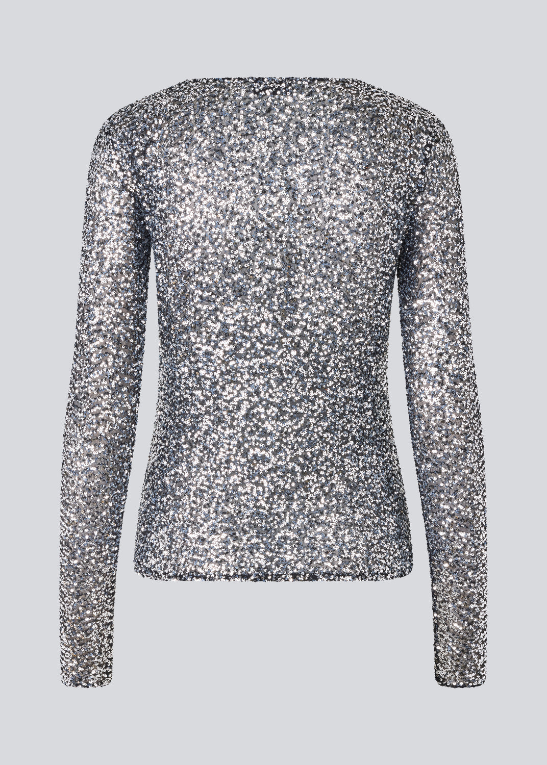 longsleeved top in silver sequence jersey. LaraMD top is fitted and has a round neck.
