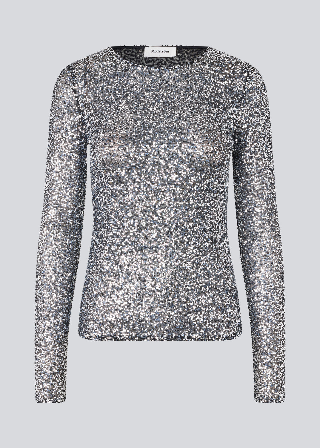 longsleeved top in silver sequence jersey. LaraMD top is fitted and has a round neck.
