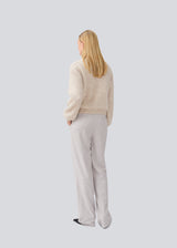 Soft beige cardigan in knit. LenniMD cardigan has a button closure in front and loose sleeves with rib.