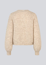 Soft beige cardigan in knit. LenniMD cardigan has a button closure in front and loose sleeves with rib.