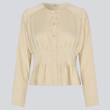 Fitted creme-colored top with boxpleats in satin. LivMD shirt has a button closure in front and loose sleeves.