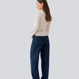 Classic jeans with wide legs and metal studs on the sides. LuccaMD jeans has a zipper, side pockets and two back pockets