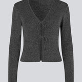 Fitted cardigan in a shimmery silver knit. LuckyMD cardigan has a v-neck and is closed with two tiebands in front.