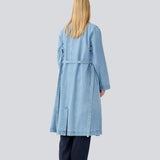 Oversized double-breasted trench coat in denim. MadelineMD denim jacket has dropped shoulders, long wide sleeves and a tieband at the waist. 
