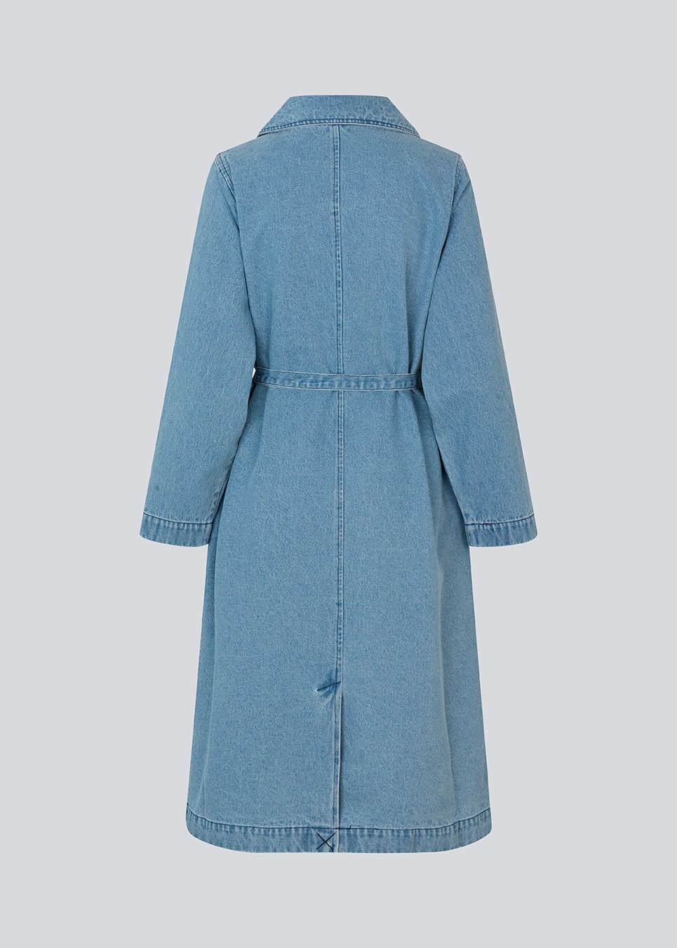 Oversized double-breasted trench coat in denim. MadelineMD denim jacket has dropped shoulders, long wide sleeves and a tieband at the waist. 