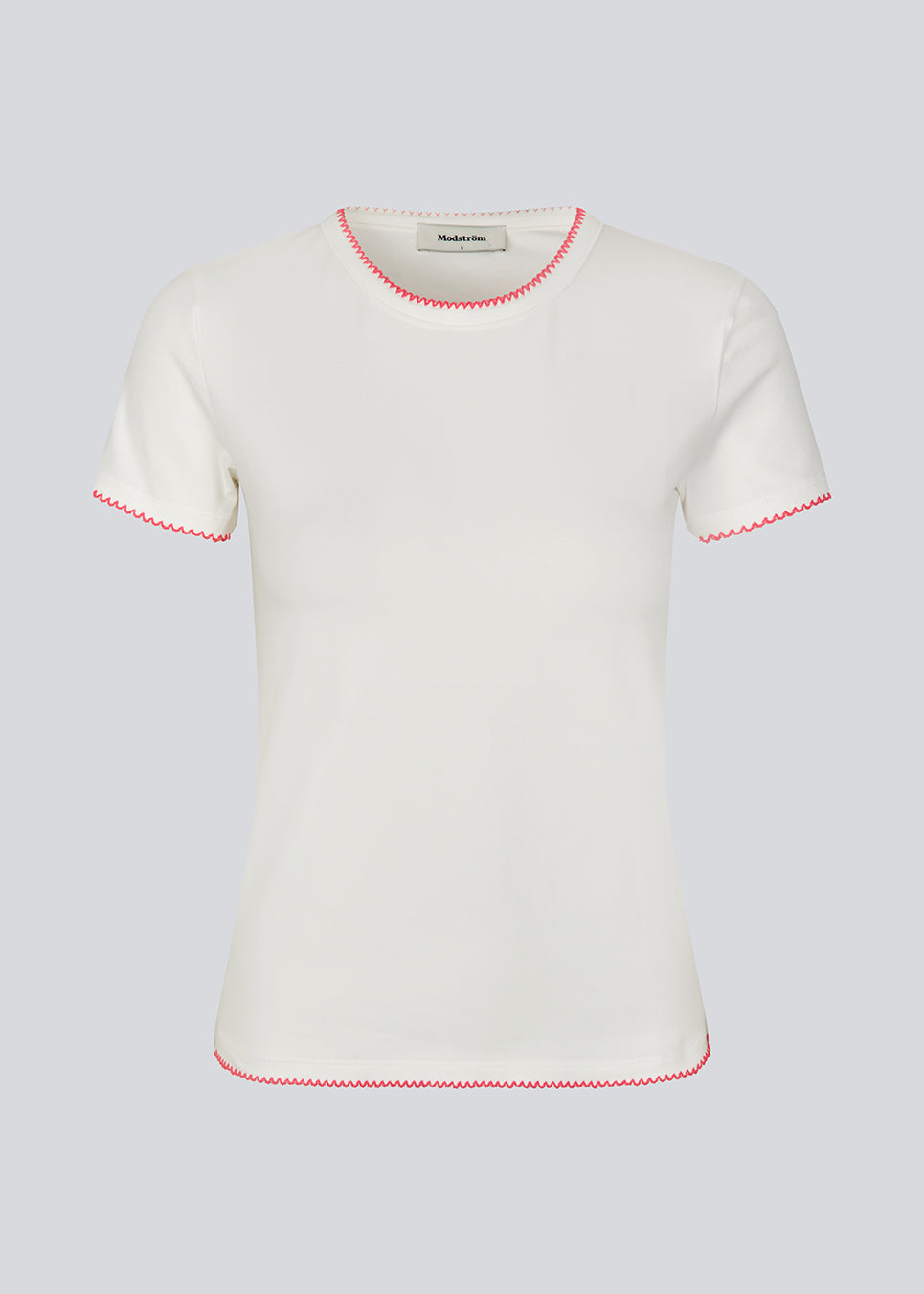Fitted t-shirt with short sleeves in cotton. MaisyMD t-shirt has a round neck and scalloped edges in a contrast color. 