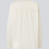 Classic shirt in white with an oversized fit. MallinMD shirt has a collar and a hidden button closure.&nbsp;