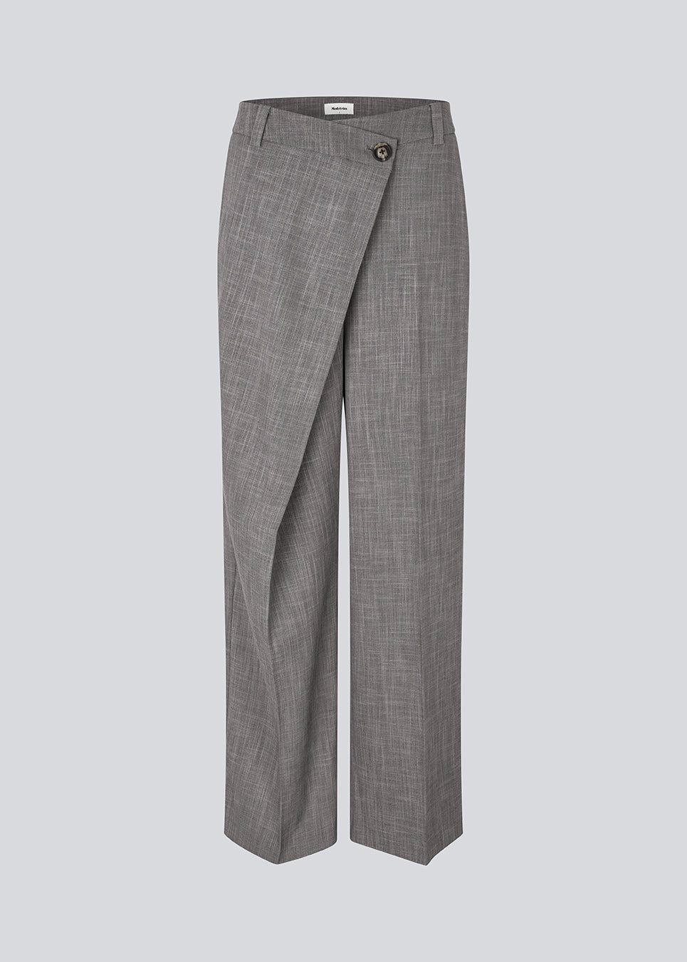 Suit pants with an asymmetrical closure detail. MalouMD pants has sidepocket, a high waist and wide legs.