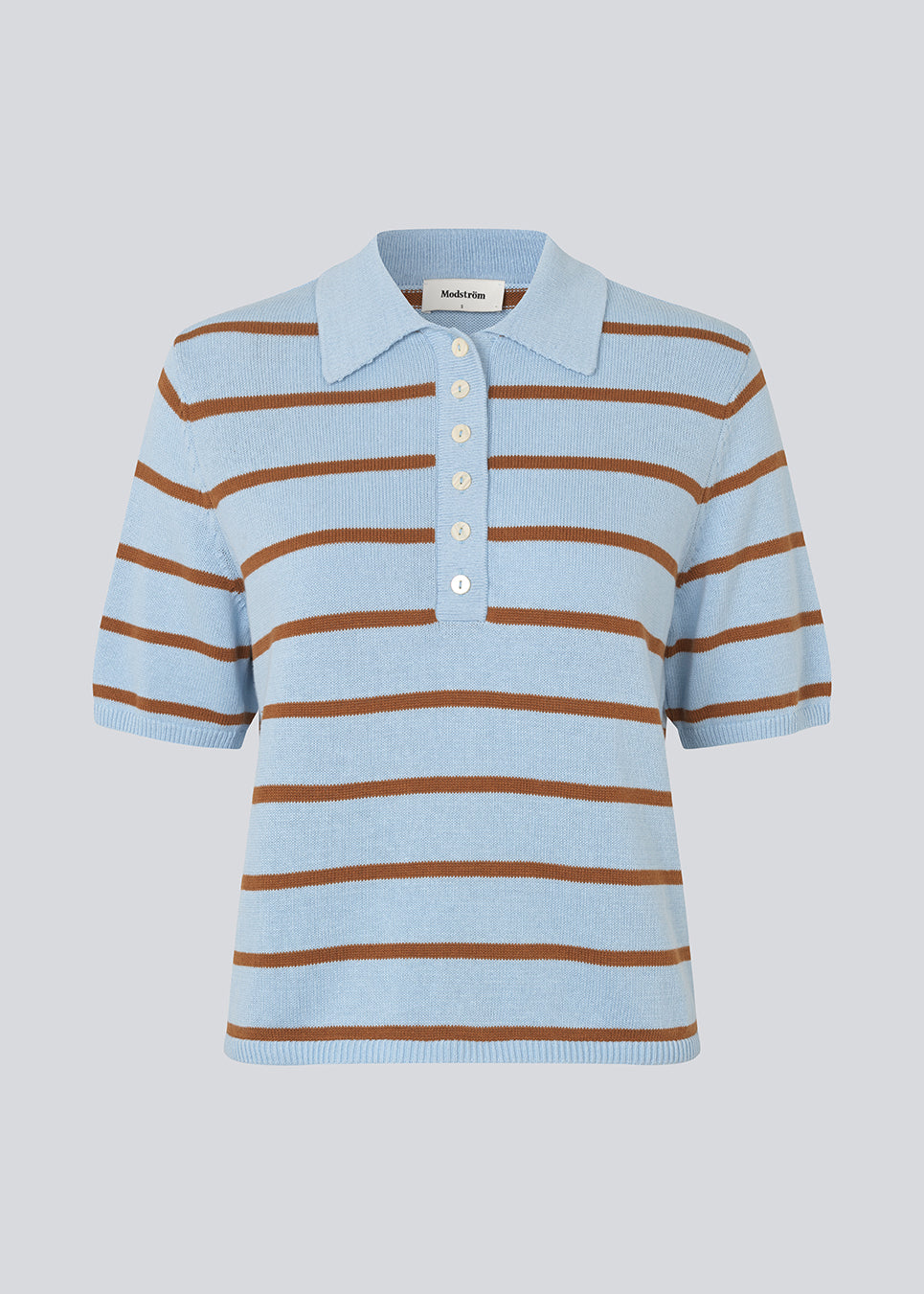 Soft knitted polo in plain jersey knit. The MalvaMD SS Polo is made from a soft, breathable cotton with short sleeves and a classic collar with a button placket. A timeless, versatile design perfect for everyday wear or weekend styling.