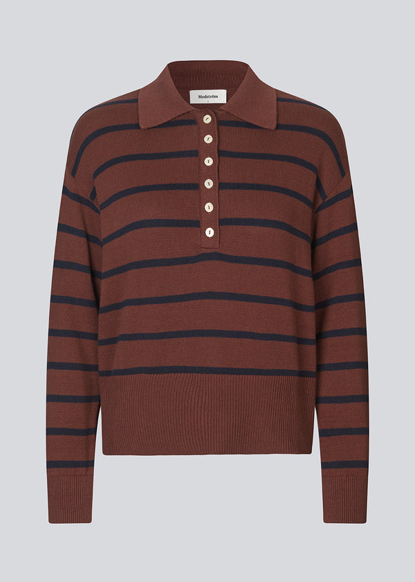 Soft knitted polo in burgundy dark red in plain jersey knit. MalvaMD stripe polo has a collar and a button closure in front.