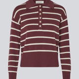 Soft knitted polo in plain jersey knit in burgundy/dark red with white stripes. MalvaMD stripe polo has a collar and a buttonclosure in front. The knit is small and slightly cropped.
