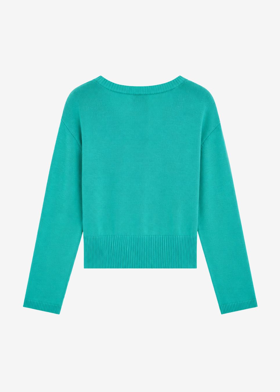 Cropped knit with a V-neckline and long sleeves. Malvamd v-neck is made from cotton and finished with ribbed edges at the neckline, cuffs and hem. Wear it with high-waisted trousers or a fluid skirt.