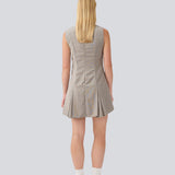 Short fitted dress with pleats. MarlyMD dress has a v-neck and an invisible zipper in the back.