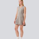 Short fitted dress with pleats. MarlyMD dress has a v-neck and an invisible zipper in the back.
