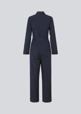 Long jumpsuit with a belt and shirtcollar. MathildeMD jumpsuit has long sleeves, a zipper in front and side pockets.