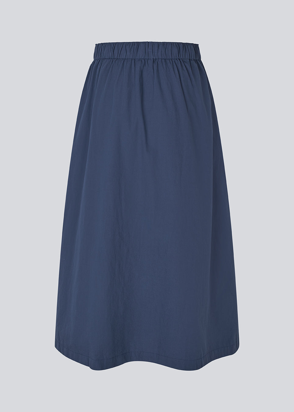 Midi skirt in 100% organic cotton. MaudeMD skirt has an a-facon and a elastic waist with a tieband. 