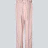 Suit pants with wide legs and an elastic waist. MaxwellMD pants has a medium-highwaist, zipper, side pockets and paspoil pocket in the back